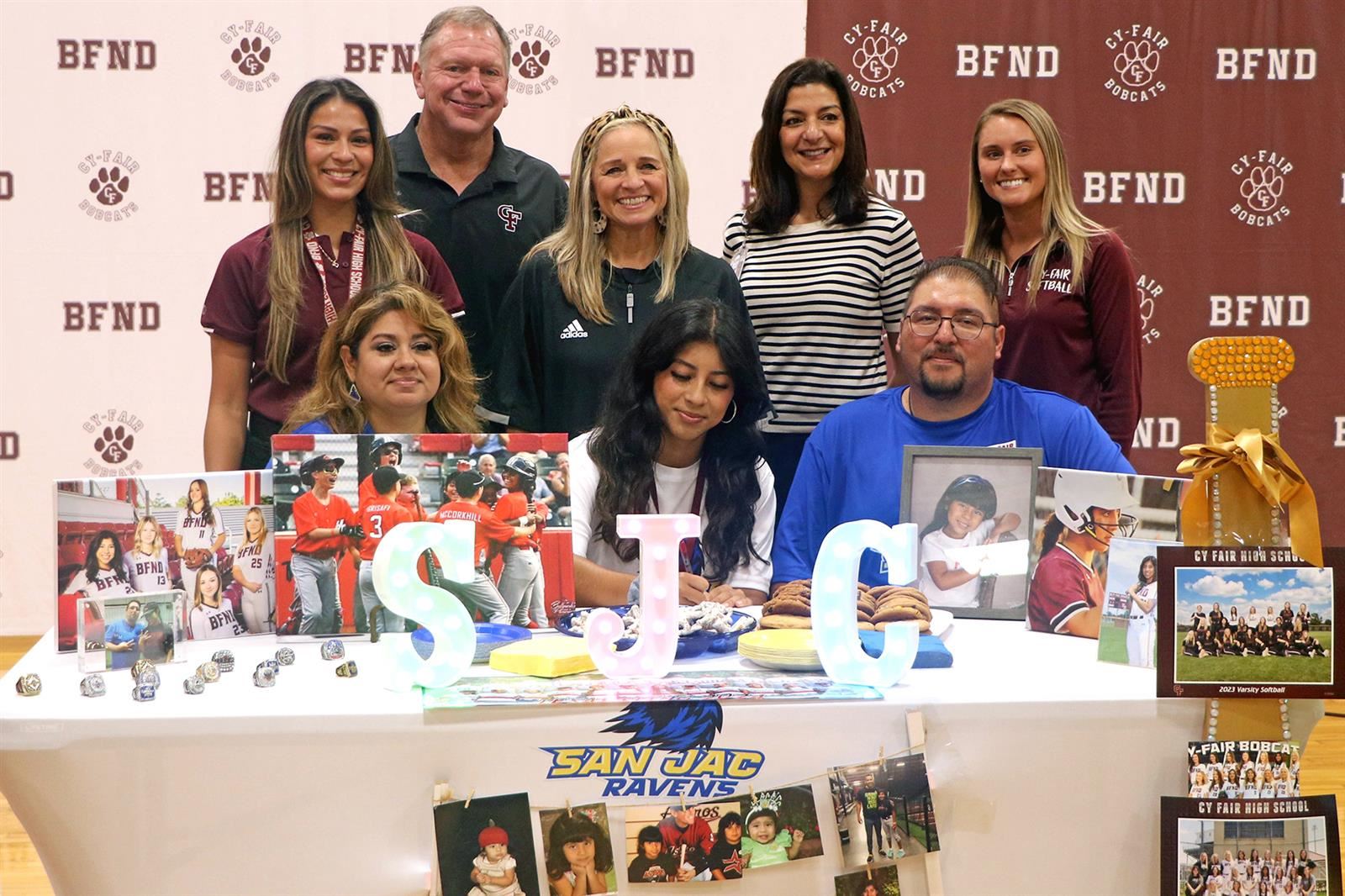 Cy-Fair High School senior Yadira Ortiz, seated center, signed a letter of intent to play softball at San Jacinto College.